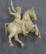 An Indian carved ivory figure on a horse height 7.5cm