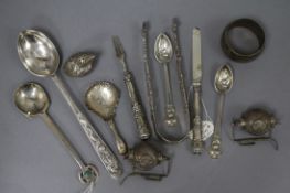 Mixed silver etc. including a pair of Georgian sugar tongs, pair of novelty condiments, a chick