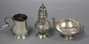 A George II small silver mug, London, 1766, together with a later silver sugar caster and a silver