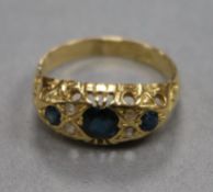 A George V 18ct gold, sapphire and diamond ring, size L/M.