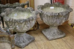 A pair of garden urns W.46cm