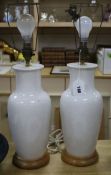 A pair of Oriental white crackle glazed table lamps height 34cm