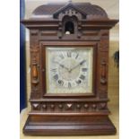 A late 19th century German mahogany cuckoo clock, of architectural form, the cuckoo appearing