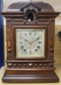 A late 19th century German mahogany cuckoo clock, of architectural form, the cuckoo appearing