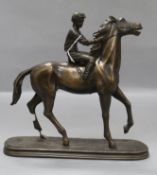 A bronzed spelter horse and rider height 28cm (a.f.)