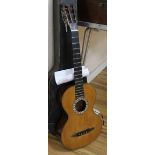 A 19th century Panormo style spruce and rosewood guitar, signed Guiot