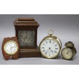 Two alarm clocks, a travel clock and a re-cased movement, 17cm