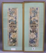 A pair of Chinese embroidered sleeve bands, framed 43 x 12cm