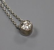 An 18ct white gold and diamond solitaire pendant necklace, the stone weighing approximately 0.