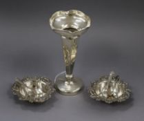 A silver spill vase, a pair of late Victorian silver bonbon dishes and four silver condiment
