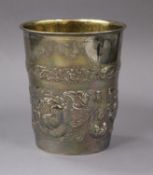 An early 20th century Danish embossed white metal beaker, stamped A. Steffensen, date for 1918, 12.