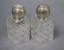 A pair of late Victorian silver mounted rectangular cut glass scent bottles, John Newton Mappin,