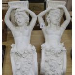 A pair of figural wall brackets length 72cm