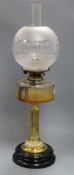 An oil lamp overall height 66cm