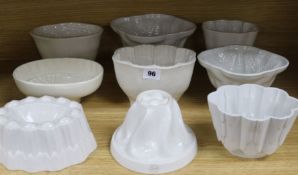 Nine porcelain jelly moulds