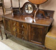 A 1920's mahogany bowfronted sideboard W.150cm