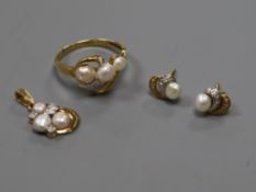 A modern suite of 18ct gold, cultured pearl and diamond jewellery, comprising a ring, pendant and