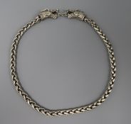 A Chinese white metal dragon head chain