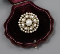 A Victorian yellow metal, rose cut diamond and untested pearl cluster brooch in antique shell shaped