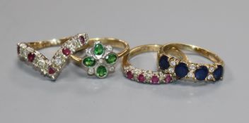 Four assorted 9ct gold and gem set rings.