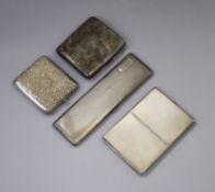 Three assorted silver cigarette cases and a white metal filligree case, longest 16.9 cm.