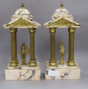 A pair of rouge marble classical Art Deco bookends height 34cm