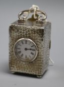 An Edwardian silver cased travelling timepiece by William Comyns, London, 1901, 11cm over handle.