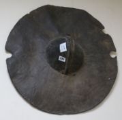 A 19th century Ethiopian rhinoceros hide shield, c.1880 diameter 54cm