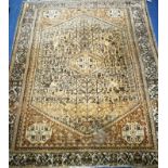 A Persian beige ground rug 185 x 150cm