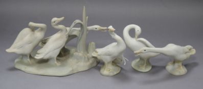 A Lladro goose group and three other models of geese