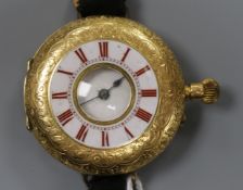 A late 19th century continental 18ct gold wrist watch (converted fob watch?).