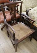 A 19th century Chippendale style elbow chair