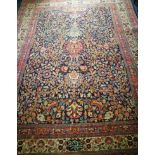 A Tabriz blue ground carpet, slight wear 340 x 270cm