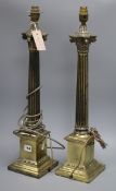 A pair of brass column brass lamps height 59cm