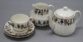 A 1920's child's tea set tallest 9.5cm