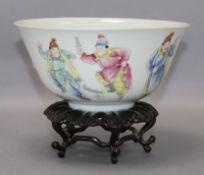 A Chinese famille rose bowl, Qianlong mark but early 20th century diameter 17.5cm, wood stand