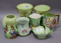 A group of Carlton Ware 1930s lime green ground pottery comprising six vases, a dish and a jug