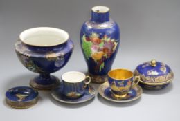 Carlton Ware powder blue ground pottery: Two vases, a powder bowl and cover, two cups and saucers