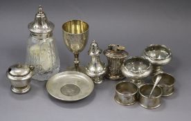 Small silver items including four condiments, dish, goblet, sifter and three napkin rings and a