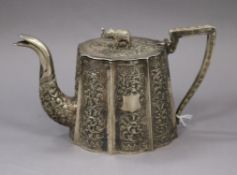 A late 19th/early 20th century Indian white metal teapot, with elephant finial, height 11cm, gross