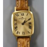A lady's 18ct gold Baume & Mercier manual back wind wrist watch.