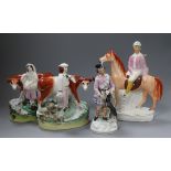 Four mid 19th century Staffordshire pottery groups and figures tallest 23cm