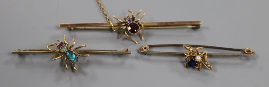 An Edwardian 9ct gold, opal and gem set spider bar brooch, one other similar yellow metal and gem