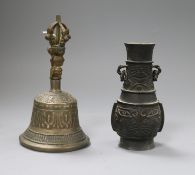 A Chinese archaistic bronze vase and a ghanta bell 12 and 15cm high