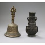 A Chinese archaistic bronze vase and a ghanta bell 12 and 15cm high