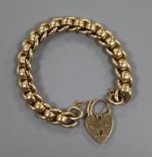 A 9ct gold curb link bracelet 51.8g.