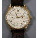 A gentleman's Swiss 18ct gold chronograph manual wind wrist watch.