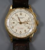 A gentleman's Swiss 18ct gold chronograph manual wind wrist watch.