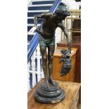 A bronze of a boy holding cat by Gilbert height 79cm