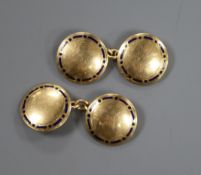 A pair of 15ct gold and enamel cufflinks, gross 9.9 grams.
